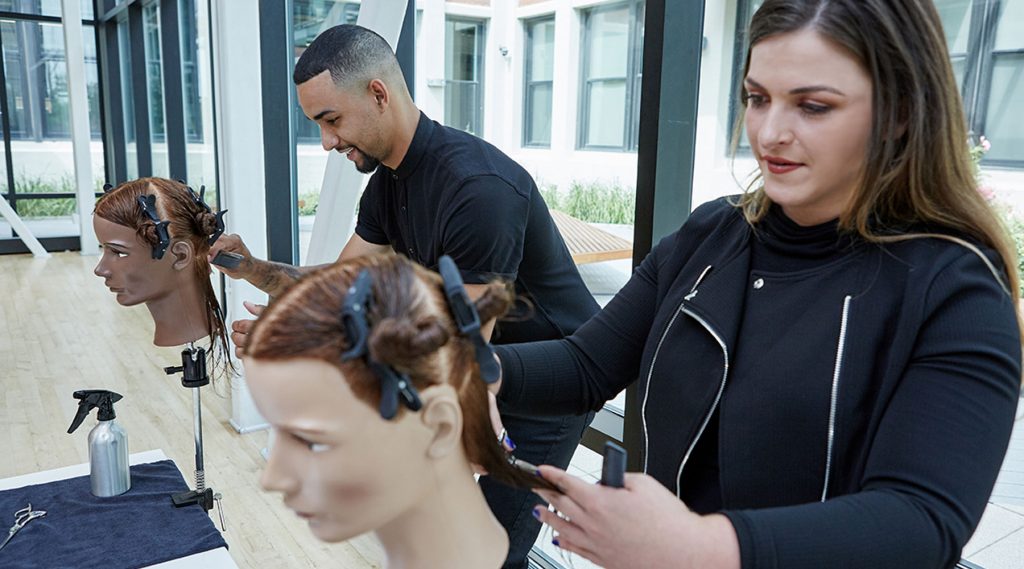 Students working on Pivot Point mannequins, snapcap