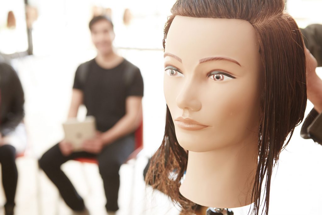 Pivot Point mannequin. Straight Hair. Brown Hair.