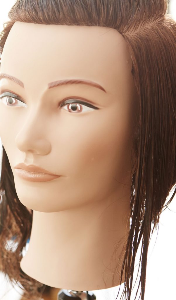 Pivot Point mannequin. Straight Hair. Brown Hair.